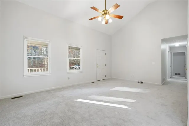 an empty room with windows