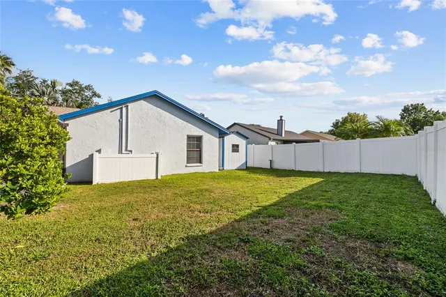 a view of a swimming pool with a garden