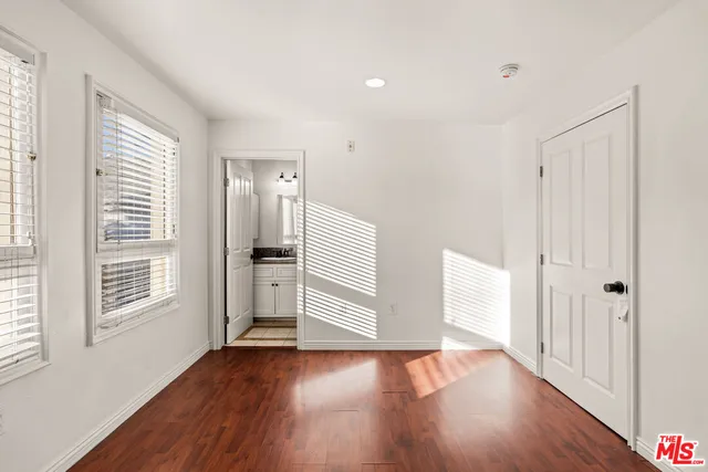 a view of entryway with wooden floor