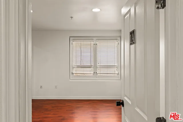 a view of a bathroom with a glass shower door