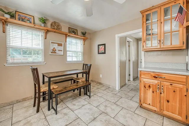 a view of a livingroom with furniture and windows