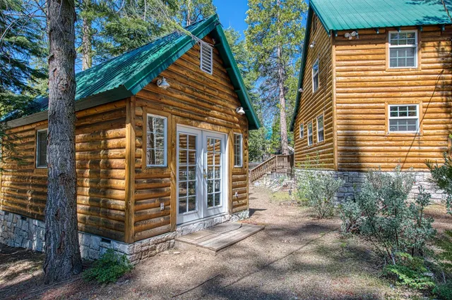 a backyard of a house with seating space