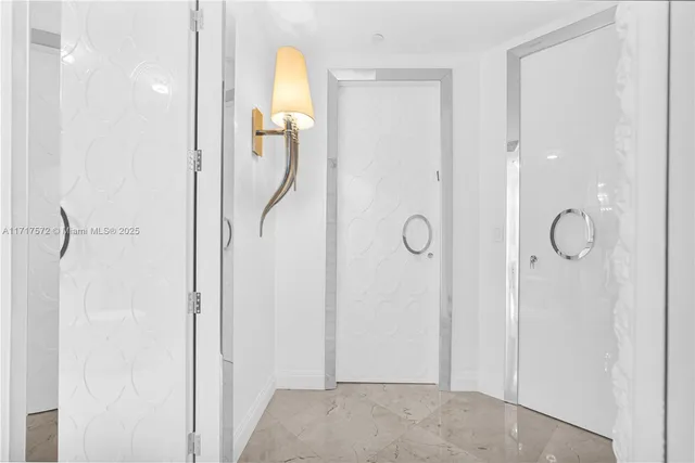 a bathroom with a sink toilet and mirror