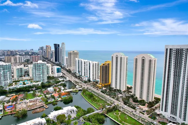 a view of a city with tall buildings