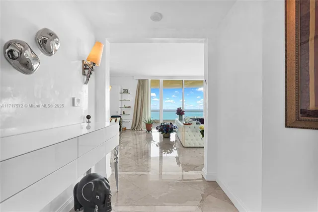 a bathroom with a tub and shower
