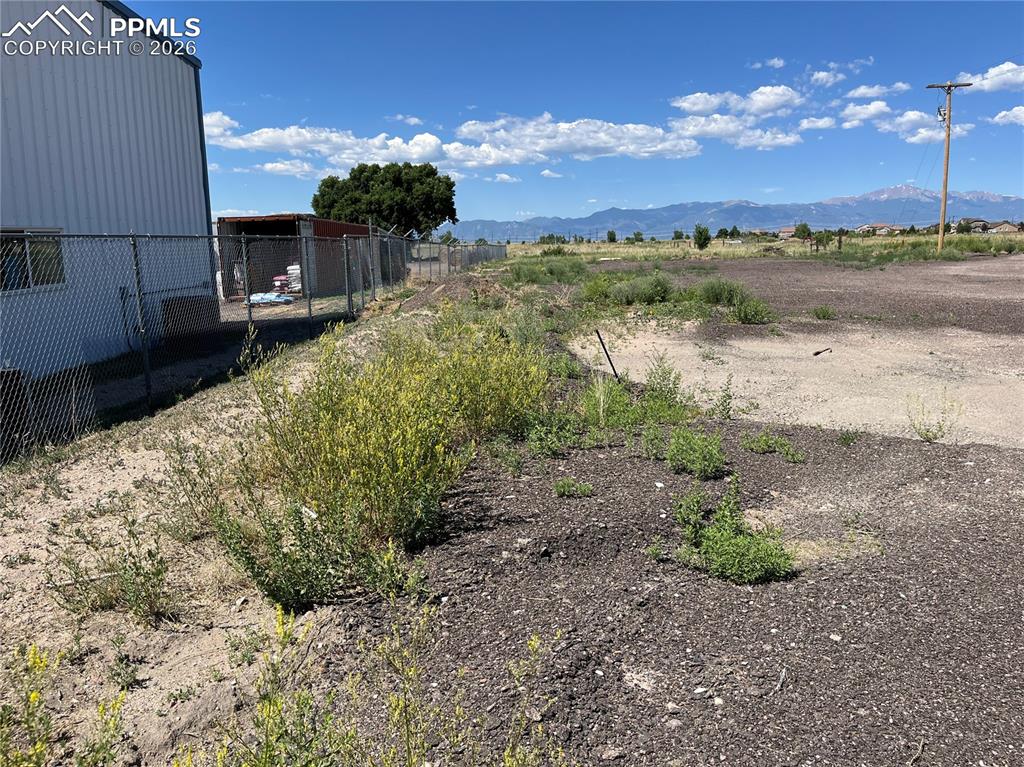 7110 Old Meridian Road Peyton, CO 80831 - Photo 14 of 20 a view of a lake with beach and city view