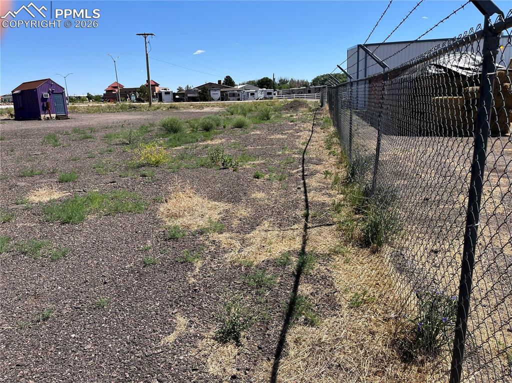 7110 Old Meridian Road Peyton, CO 80831 - Photo 15 of 20 a backyard of a house with lots of green space