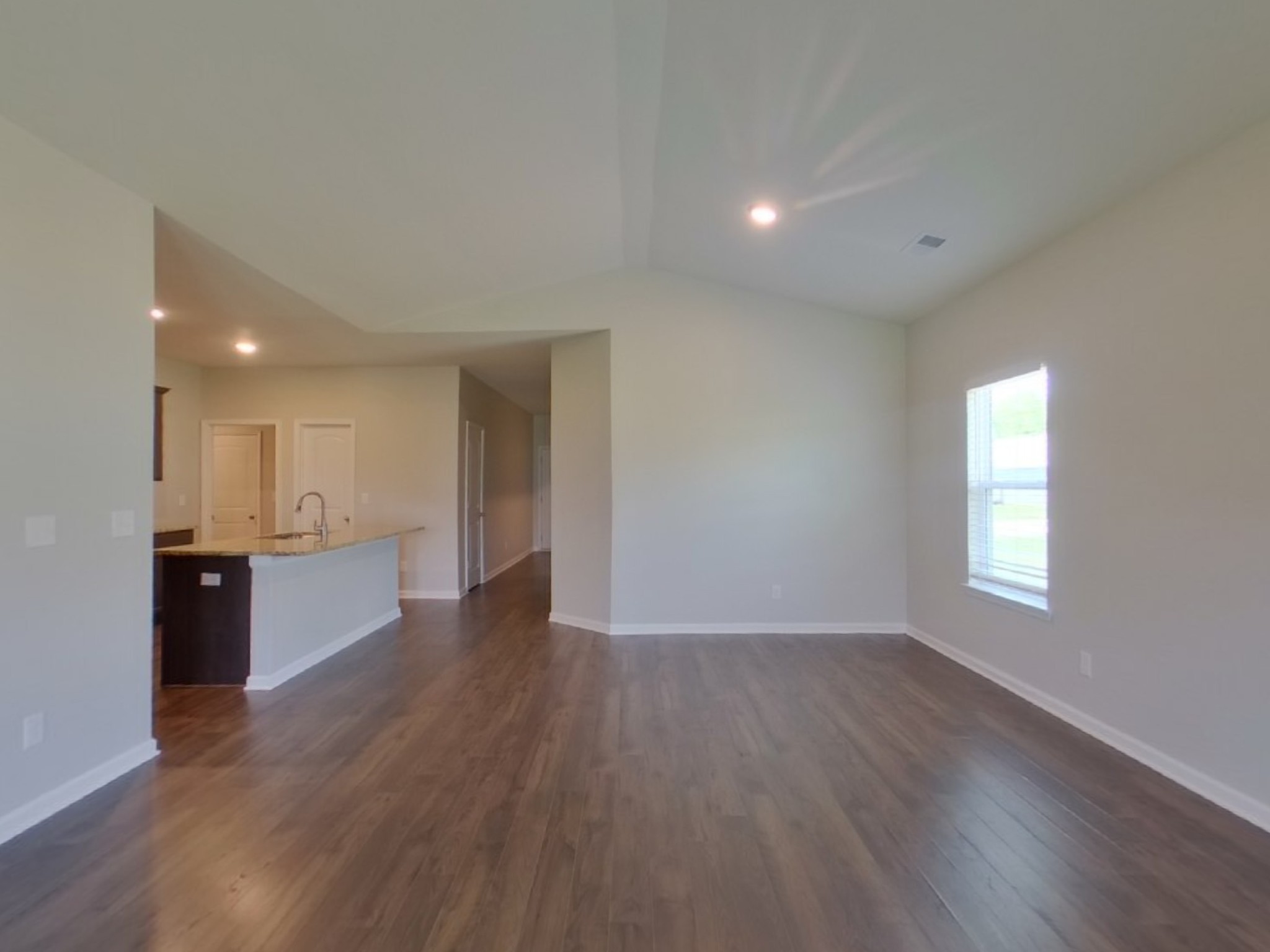2927 Beeswax Street Columbia, TN 38401 - Photo 3 of 14 a view of an empty room with window and wooden floor