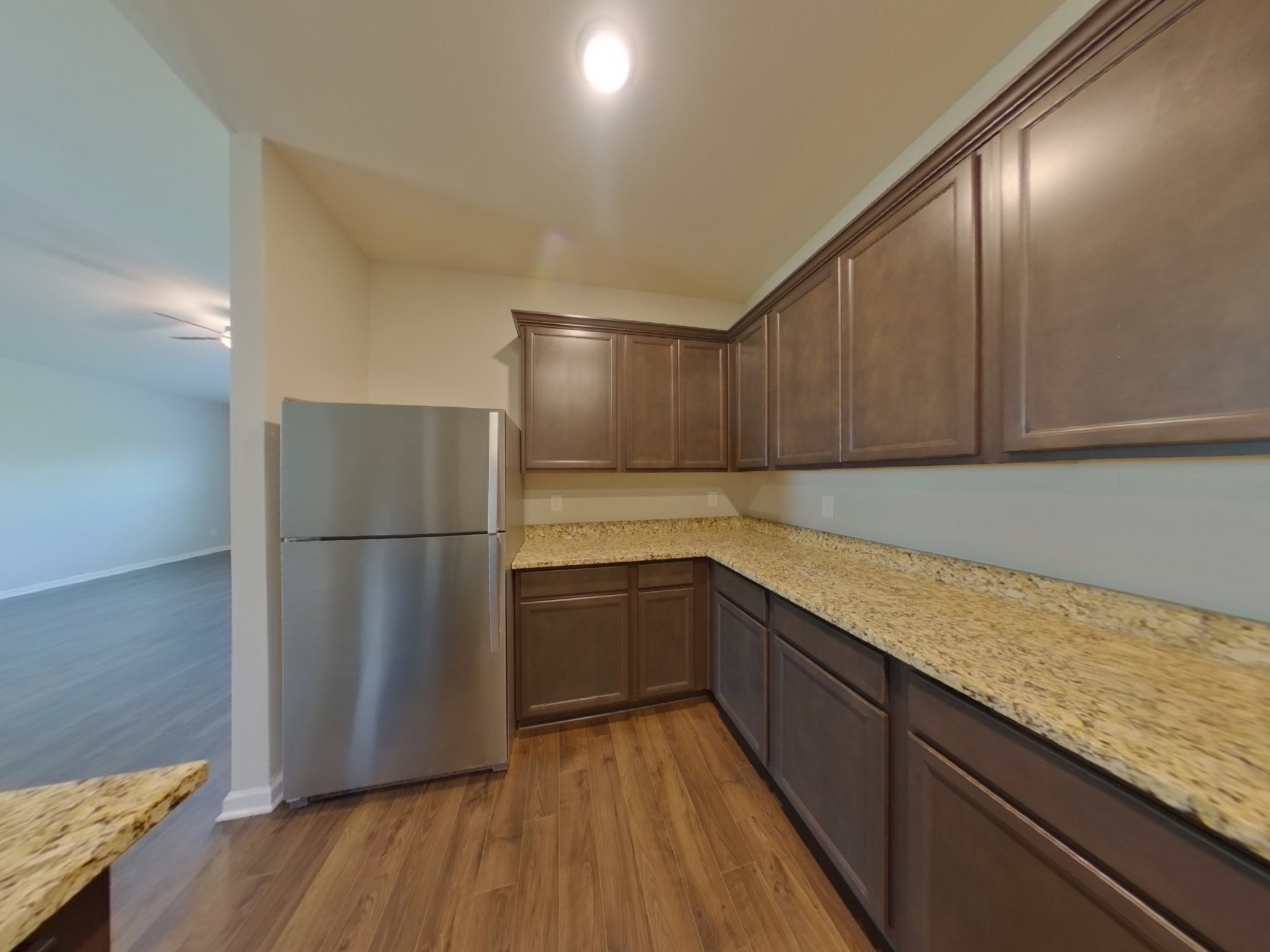 2927 Beeswax Street Columbia, TN 38401 - Photo 5 of 14 a kitchen with a sink and wooden floor