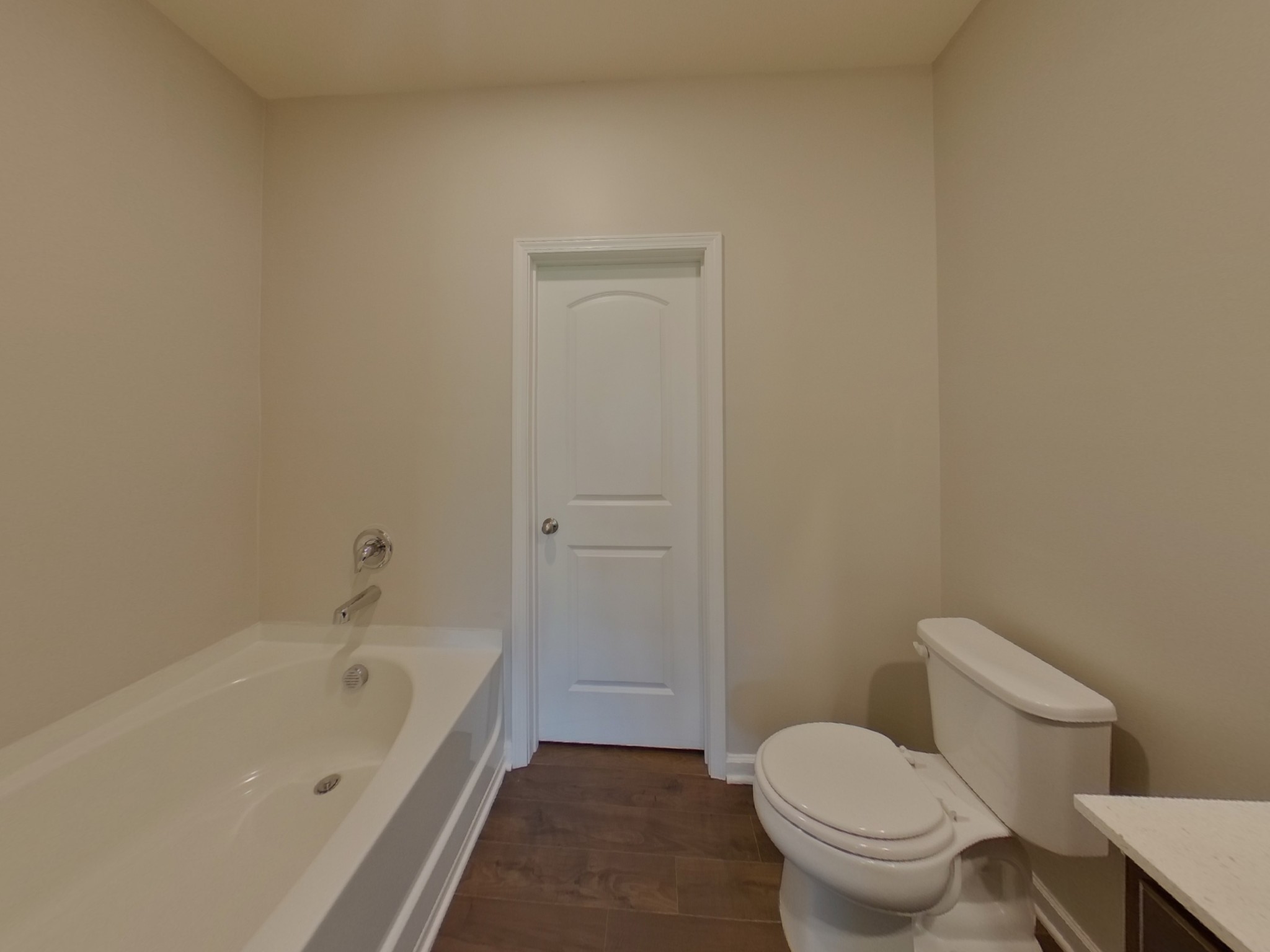 2927 Beeswax Street Columbia, TN 38401 - Photo 8 of 14 a white toilet sitting next to a bath tub