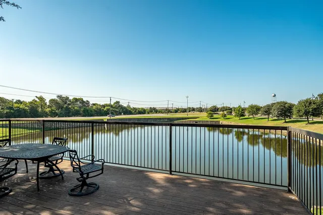 a view of a patio with a table chairs and a patio