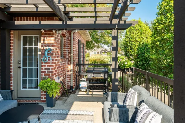 a view of a porch with seating space