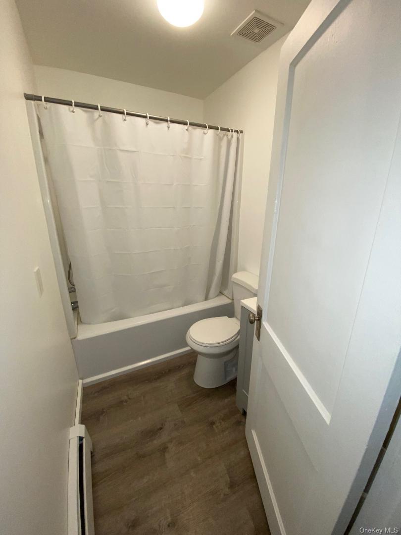 87 Deltic Road, Unit 5A New City, NY 10956 - Photo 8 of 9 Beatifully updated bathroom has a shower/tub combination.