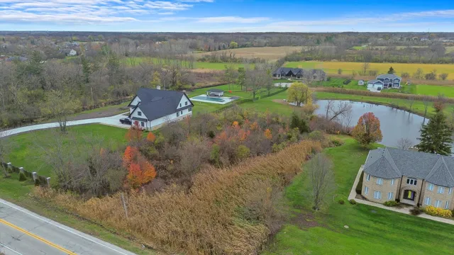 a view of a lake with a yard