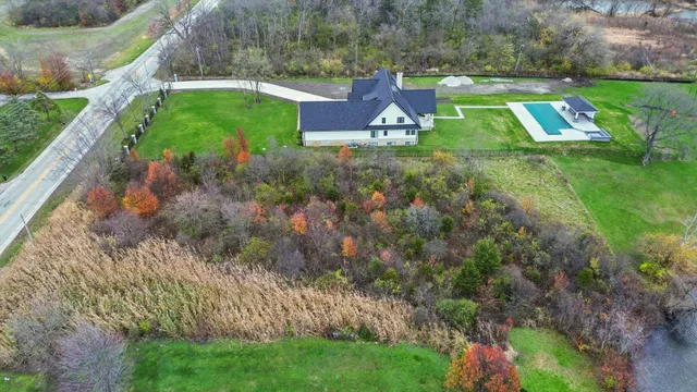 a view of an house with a yard