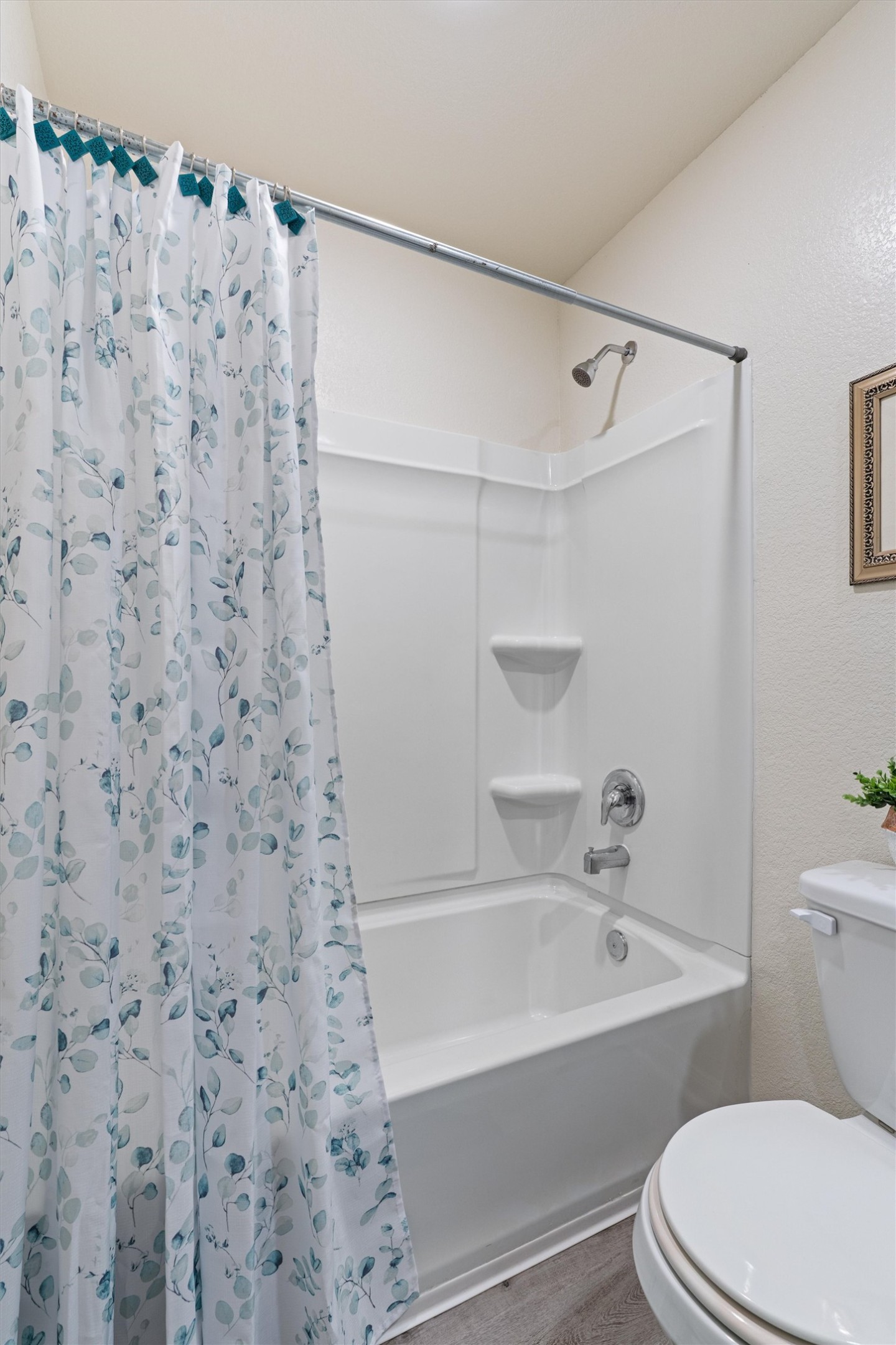163 Niven Path, Unit 12K Jarrell, TX 76537 - Photo 26 of 31 a bathroom with a toilet and a bathtub