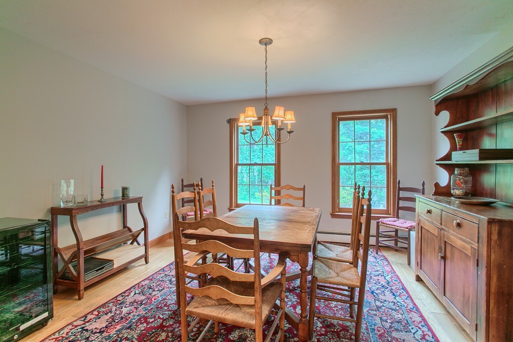 207 Beaman Road Princeton, MA 01541 - Photo 14 of 30 a view of a dining room with furniture window and wooden floor