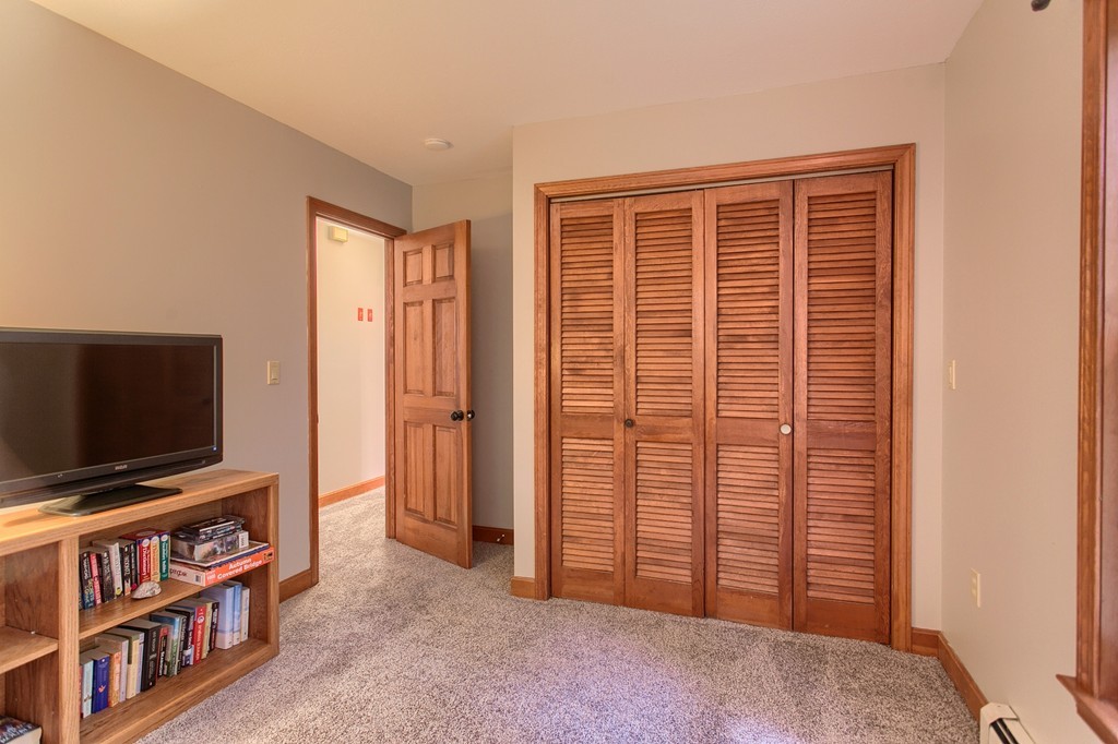 207 Beaman Road Princeton, MA 01541 - Photo 16 of 30 a view of a livingroom with furniture and a flat screen tv