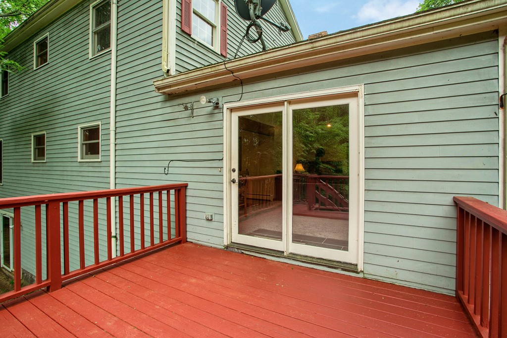 207 Beaman Road Princeton, MA 01541 - Photo 2 of 30 a view of backyard with large windows