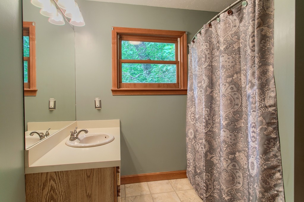 207 Beaman Road Princeton, MA 01541 - Photo 22 of 30 a bathroom with a sink and a mirror