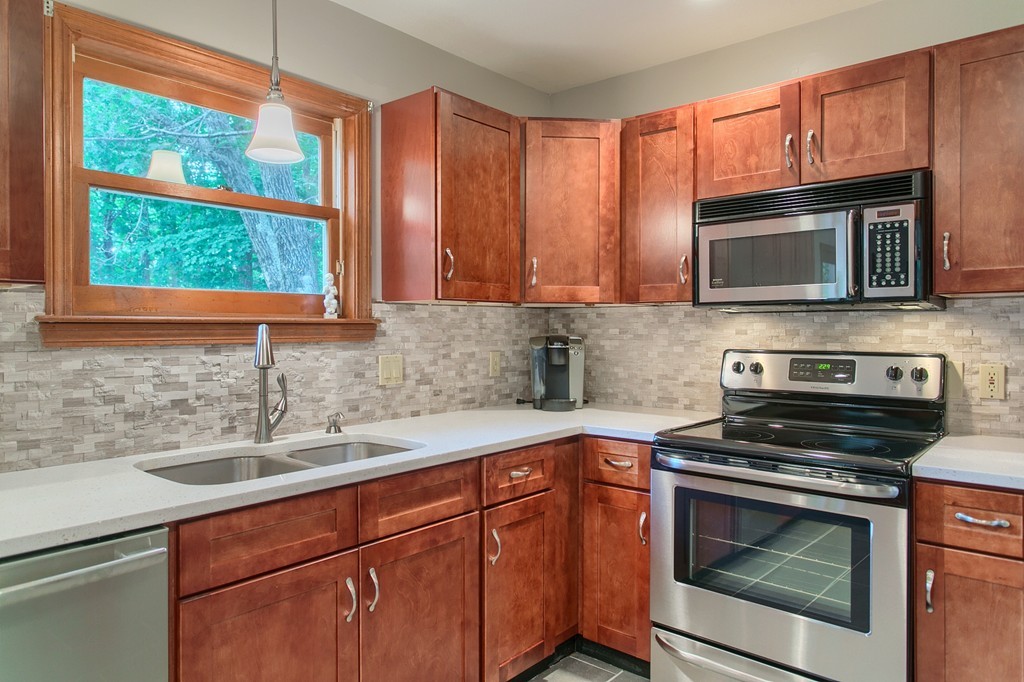 207 Beaman Road Princeton, MA 01541 - Photo 8 of 30 a kitchen with granite countertop cabinets stainless steel appliances and a sink