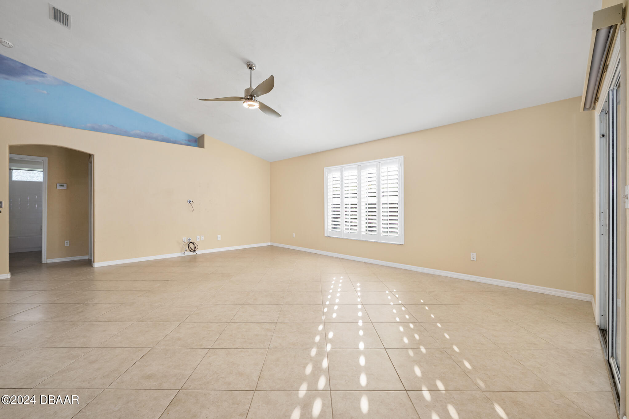 63 Spring Meadows Drive Ormond Beach, FL 32174 - Photo 14 of 49 a view of an empty room with a window