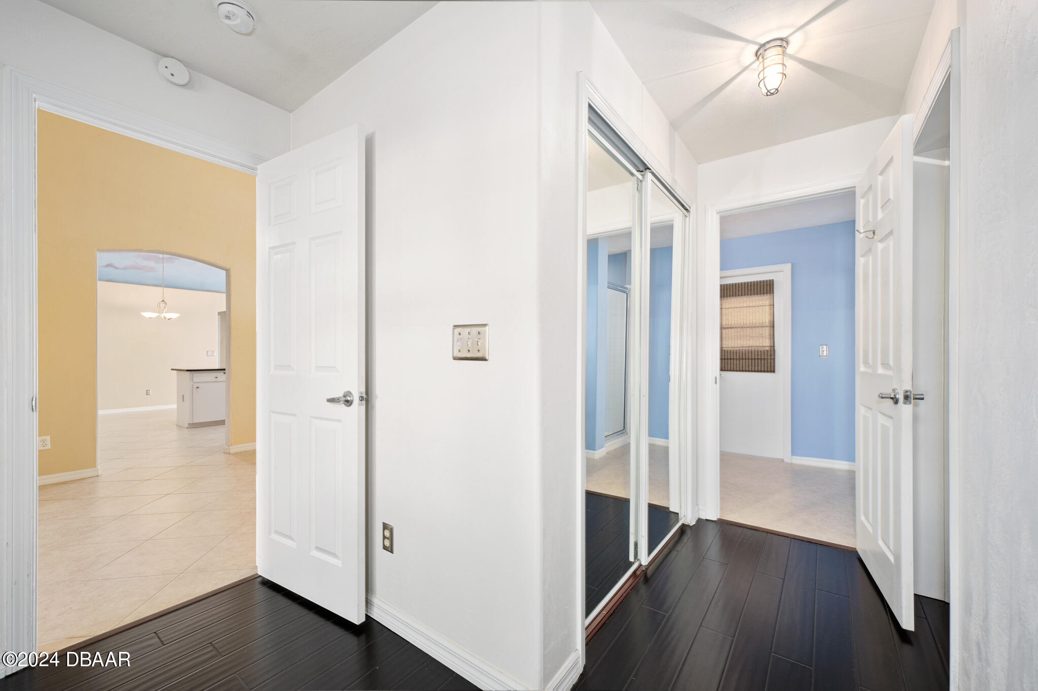 63 Spring Meadows Drive Ormond Beach, FL 32174 - Photo 20 of 49 a view of a hallway with wooden floor