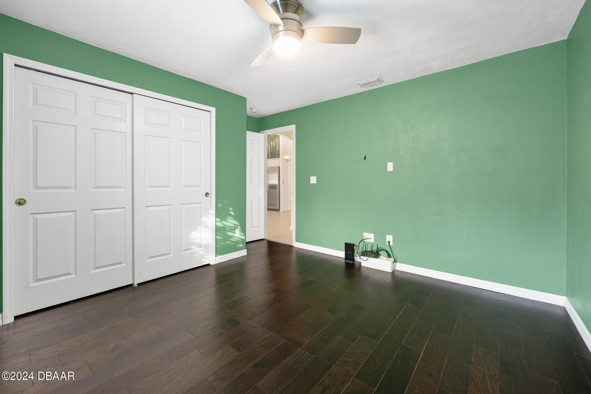 63 Spring Meadows Drive Ormond Beach, FL 32174 - Photo 26 of 49 a view of room with window and wooden floor