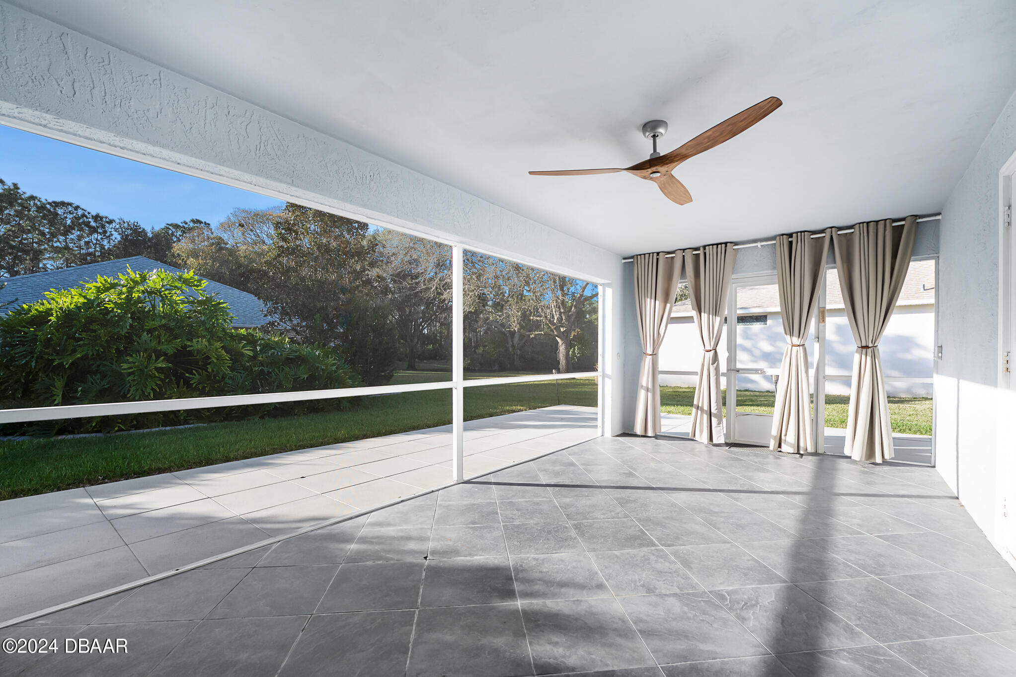 63 Spring Meadows Drive Ormond Beach, FL 32174 - Photo 30 of 49 a view of an empty room with a window