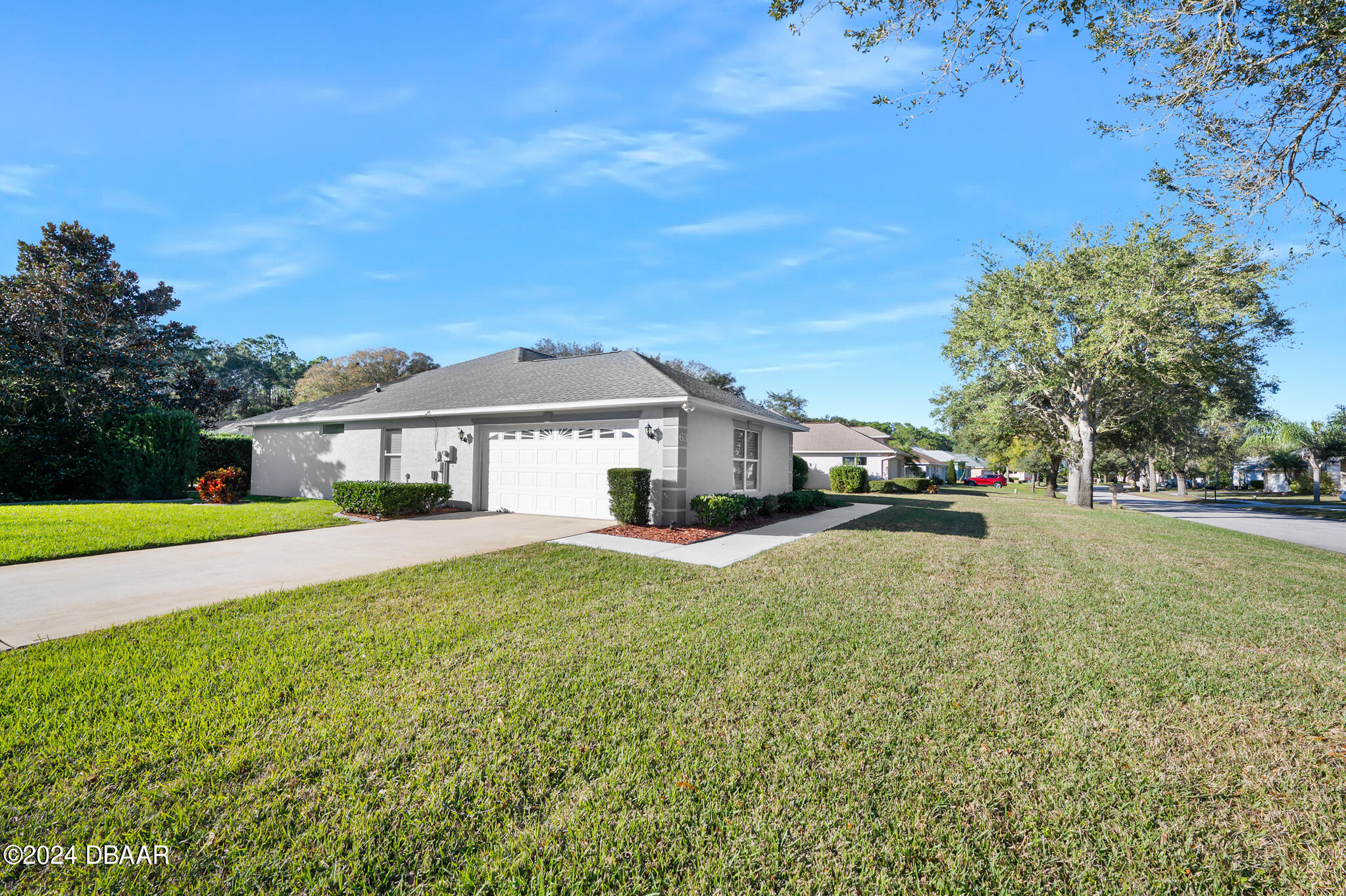 63 Spring Meadows Drive Ormond Beach, FL 32174 - Photo 3 of 49 a view of house with outdoor space and sitting area
