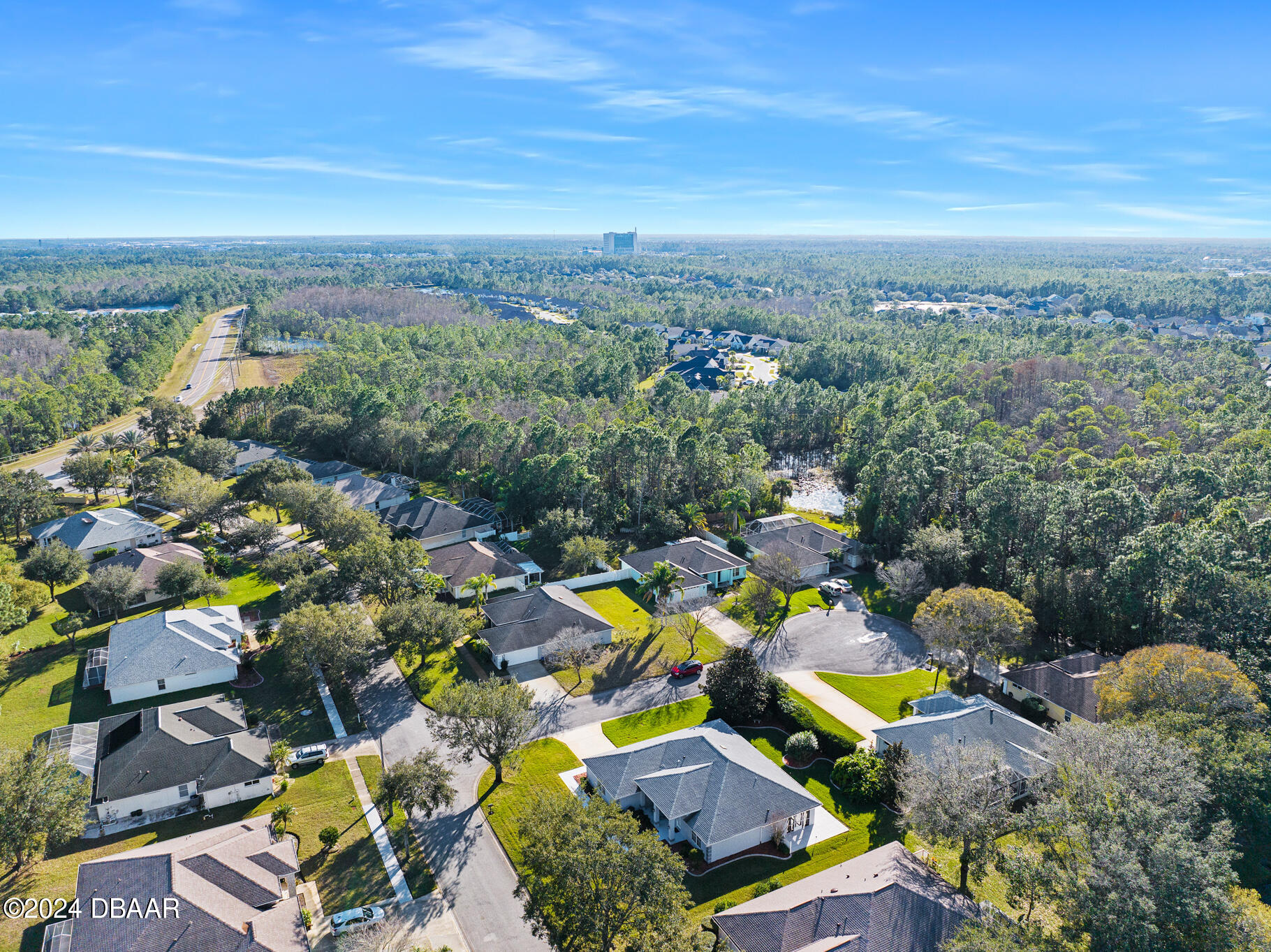 63 Spring Meadows Drive Ormond Beach, FL 32174 - Photo 38 of 49 an aerial view of a houses with a swimming pool
