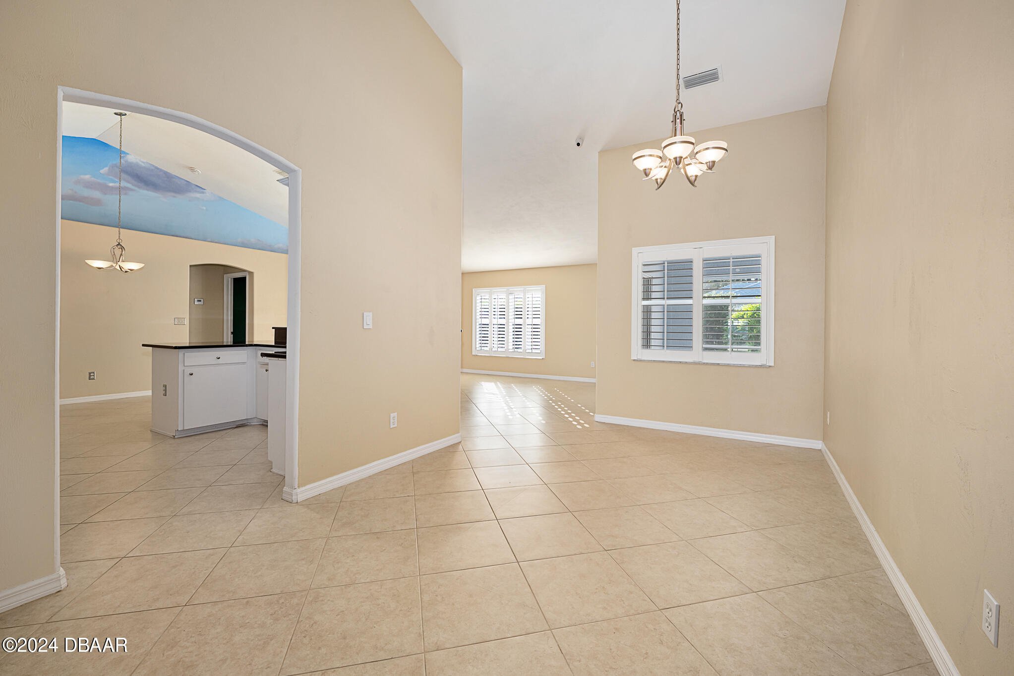 63 Spring Meadows Drive Ormond Beach, FL 32174 - Photo 9 of 49 a view of livingroom with kitchen