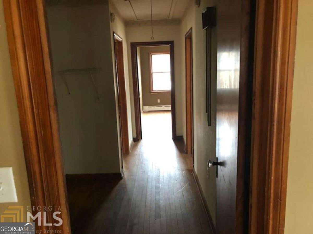 329 McDonough Road Jackson, GA 30233 - Photo 6 of 11 a view of gallery with wooden floor