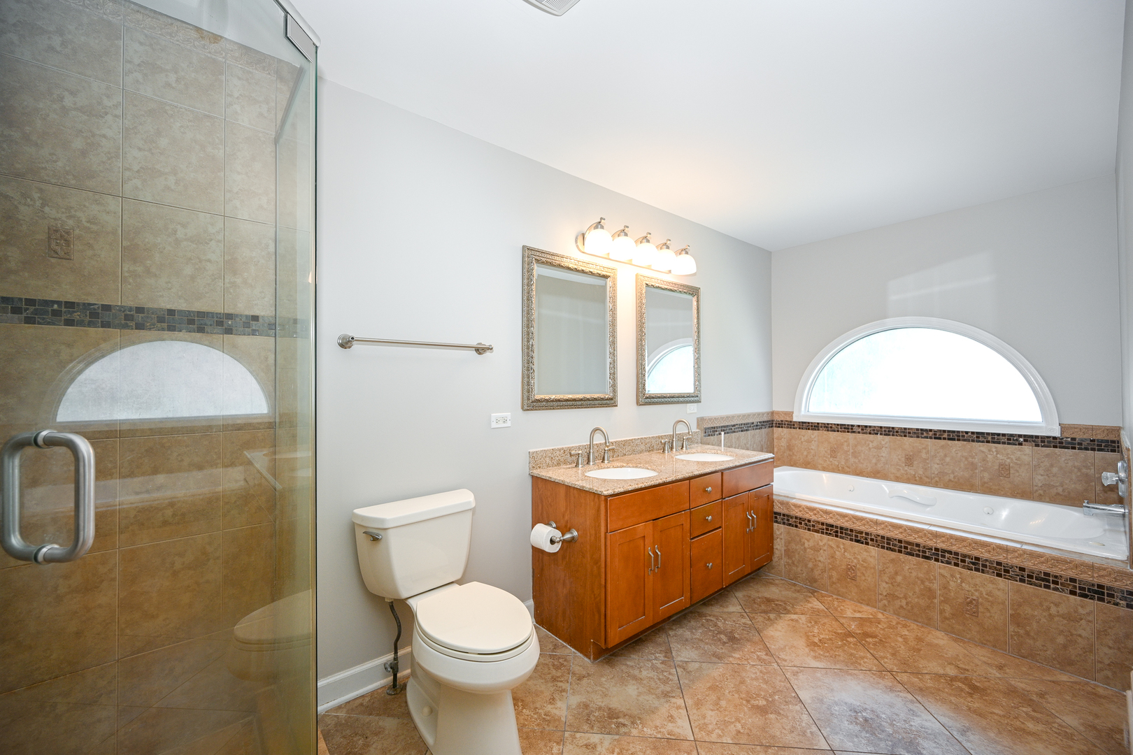 3S178 Pattermann Road Warrenville, IL 60555 - Photo 18 of 33 a bathroom with a granite countertop sink mirror vanity and toilet