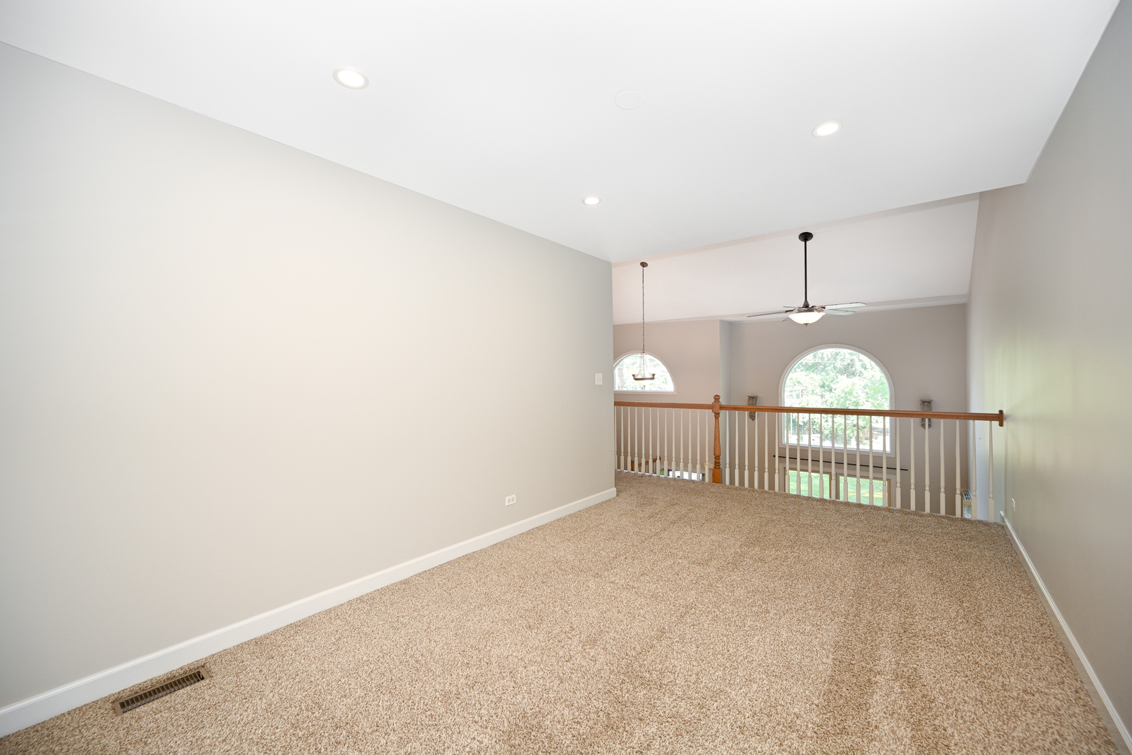 3S178 Pattermann Road Warrenville, IL 60555 - Photo 20 of 33 a view of a livingroom with wooden floor and a window
