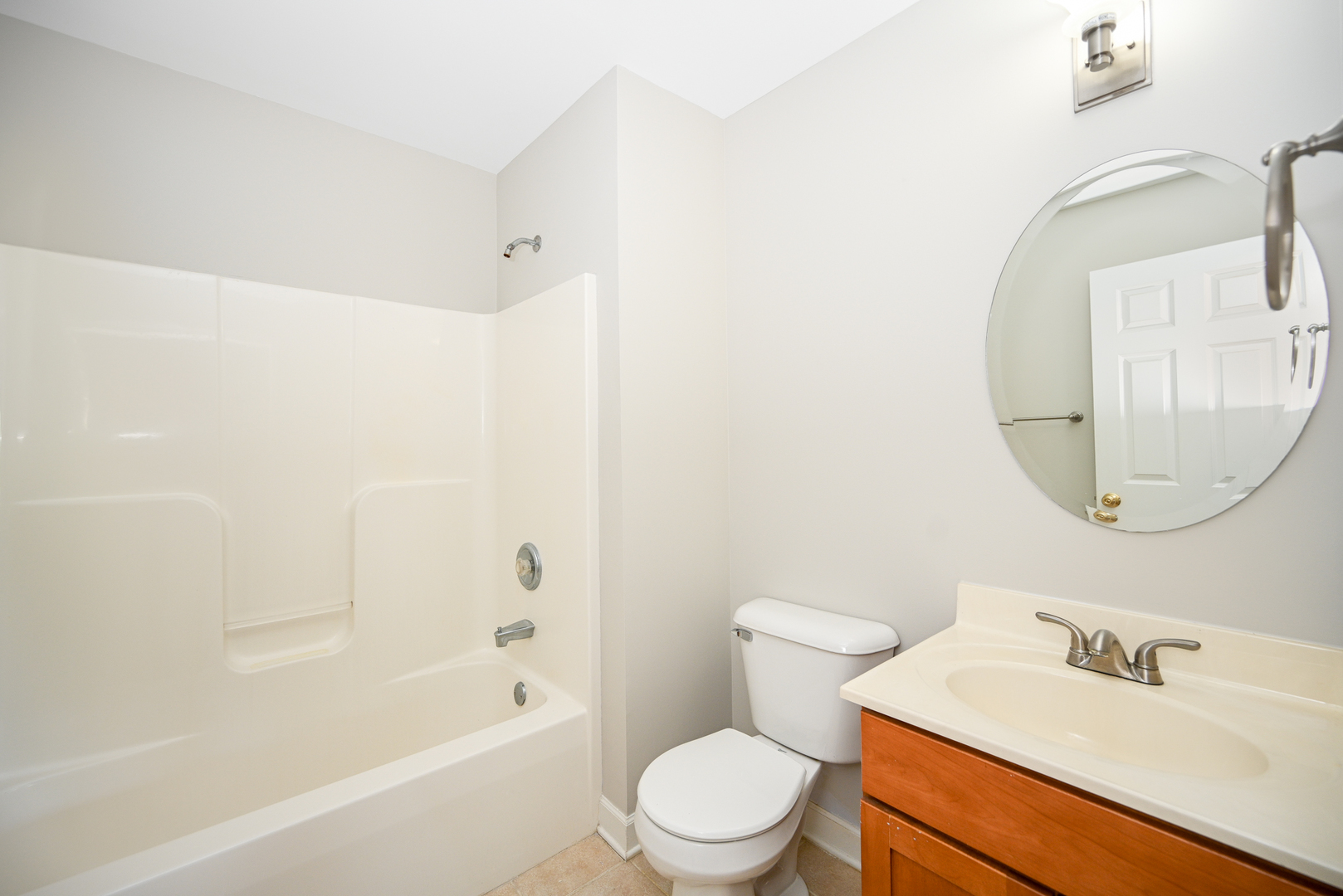 3S178 Pattermann Road Warrenville, IL 60555 - Photo 22 of 33 a bathroom with a sink toilet and a mirror