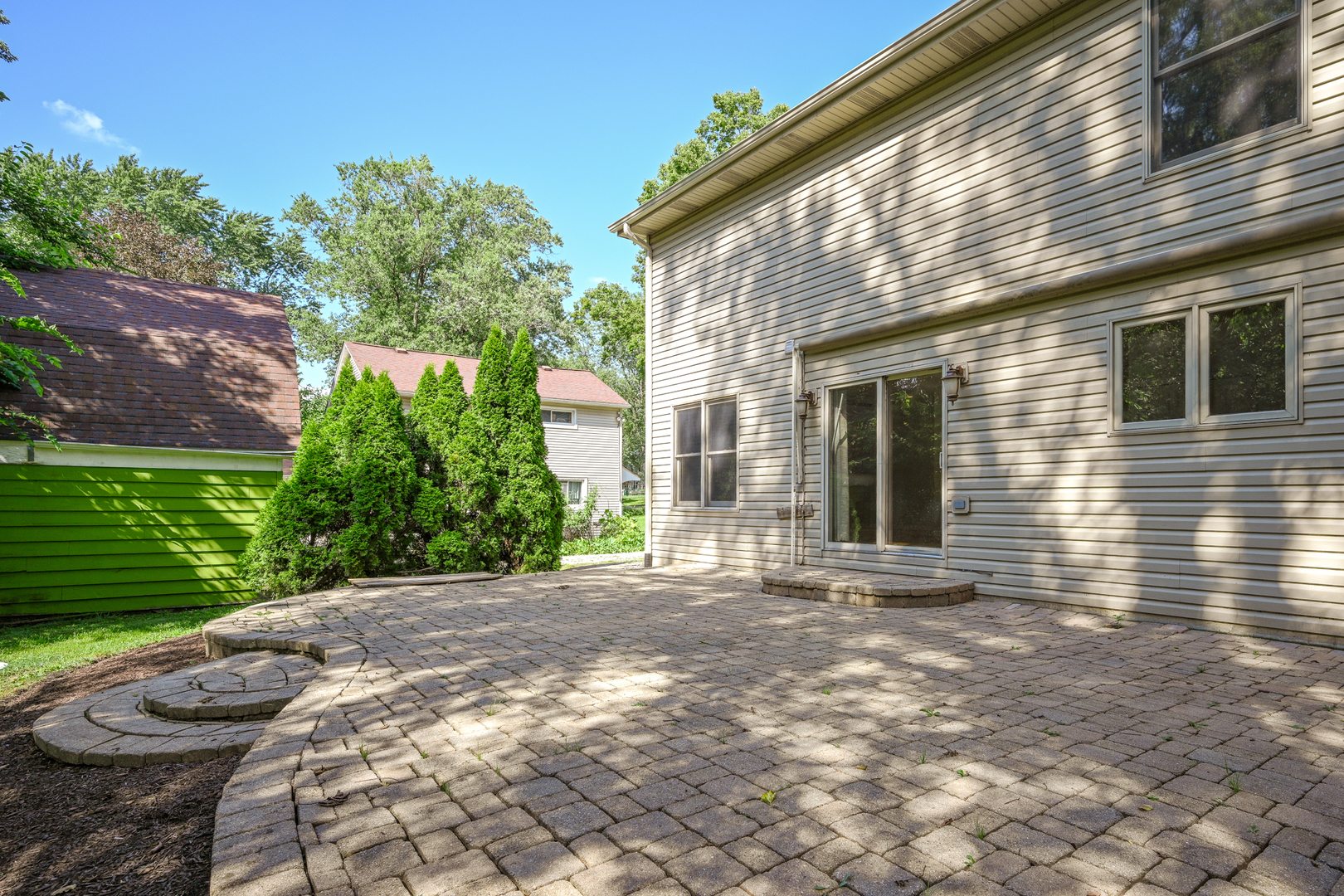 3S178 Pattermann Road Warrenville, IL 60555 - Photo 27 of 33 a front view of a house with a yard
