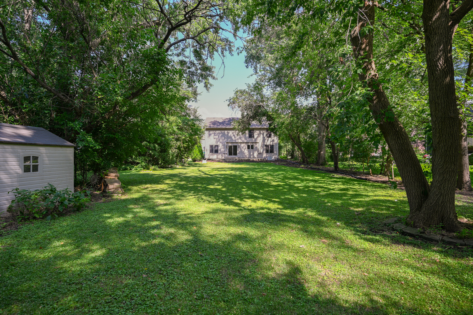 3S178 Pattermann Road Warrenville, IL 60555 - Photo 28 of 33 a view of a house with a big yard
