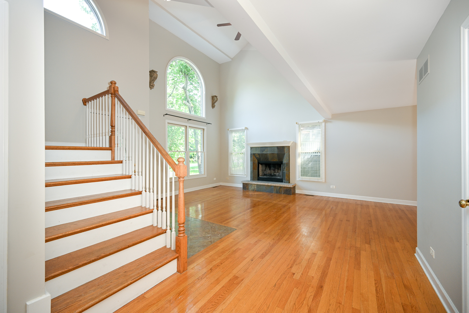 3S178 Pattermann Road Warrenville, IL 60555 - Photo 10 of 33 a view of empty room with wooden floor fan and window