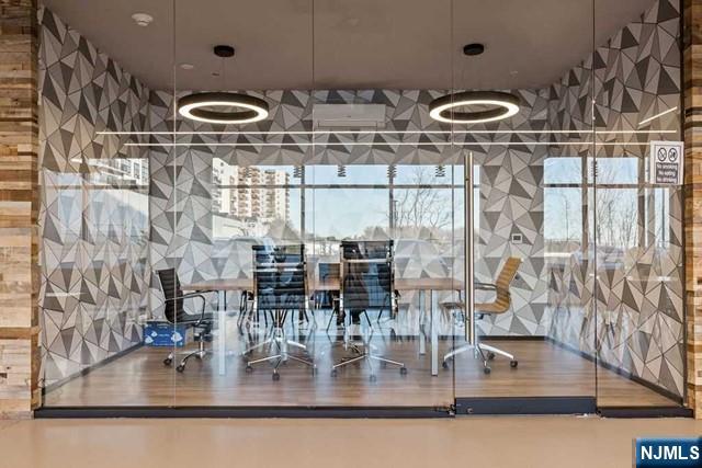 520 Cliff Street, Unit 503 Fairview, NJ 07022 - Photo 20 of 22 a kitchen with a sink and a stove with wooden floor