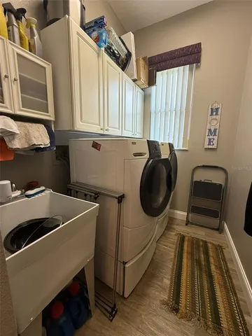a utility room with dryer and washer