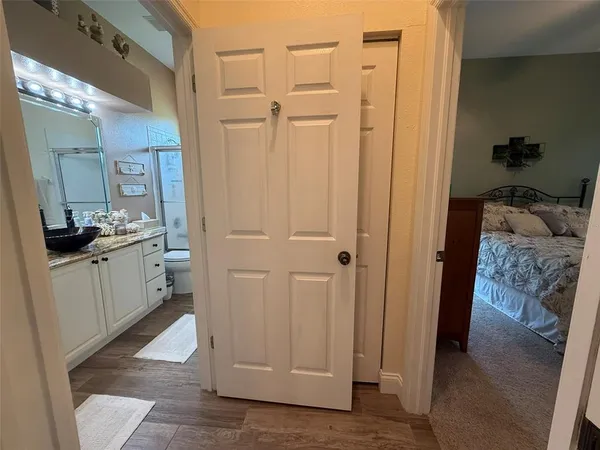 a bathroom with a sink and mirror