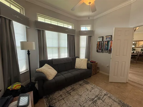 a living room with furniture and a window