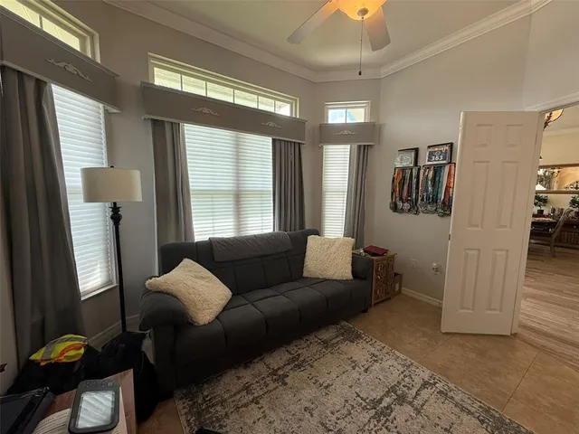 a living room with furniture and a window