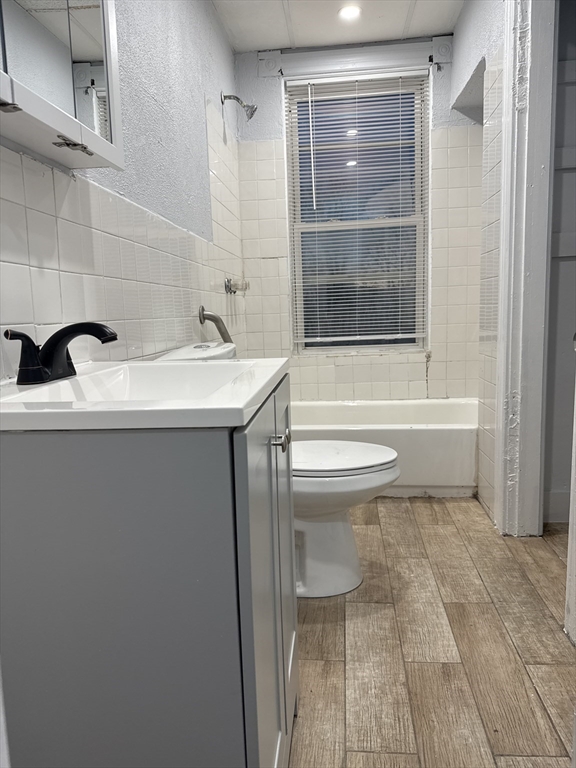 2 Orne Street, Unit 2 Worcester, MA 01605 - Photo 5 of 10 a bathroom with a sink toilet and shower