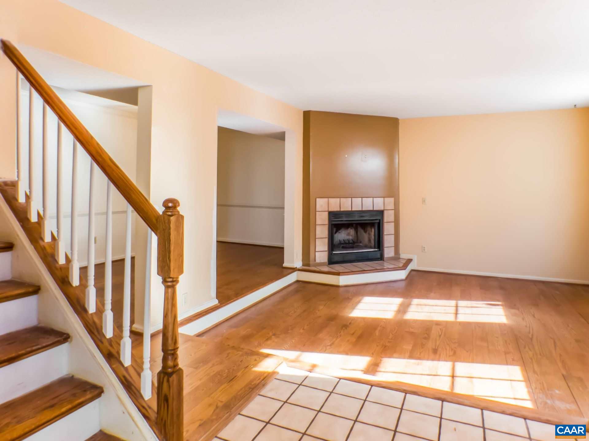 300 Westfield Road Charlottesville, VA 22901 - Photo 13 of 26 a view of an empty room with wooden floor and a window