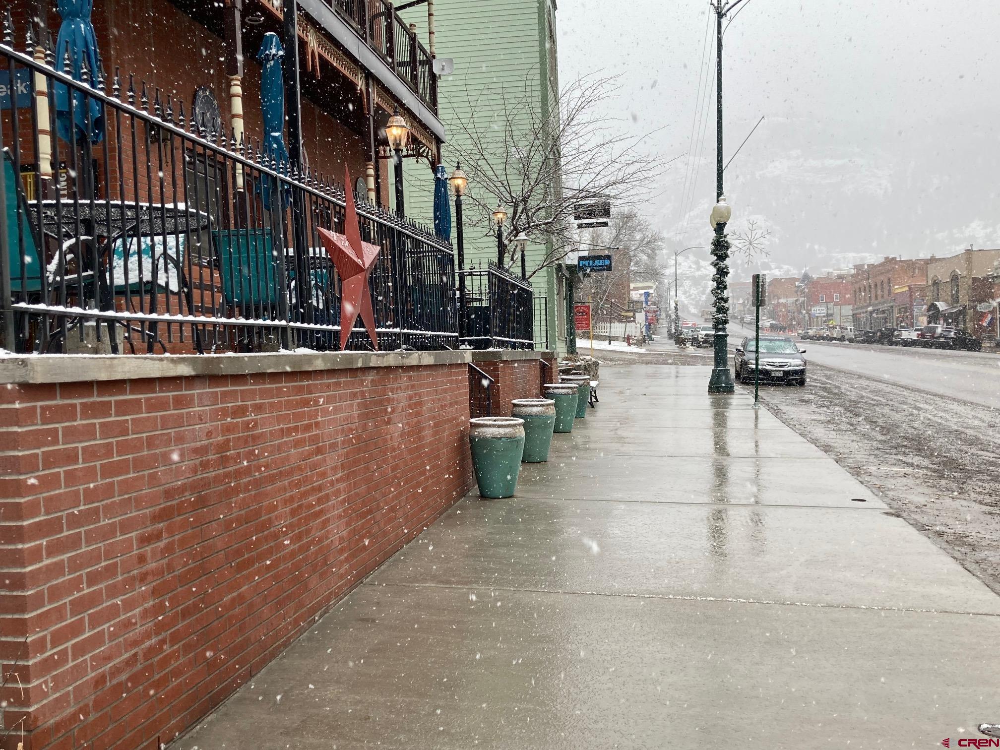 807 Main Street, Unit 3 Ouray, CO 81427 - Photo 4 of 22 a view of a city with tall buildings