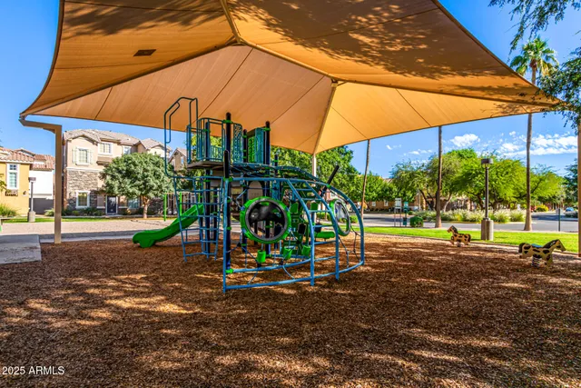 a view of a park with swings