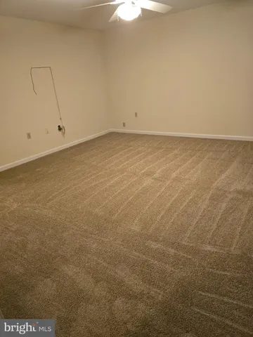 a bathroom with a sink a mirror and a shower