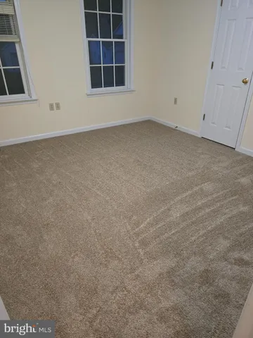 a view of a backyard of the house